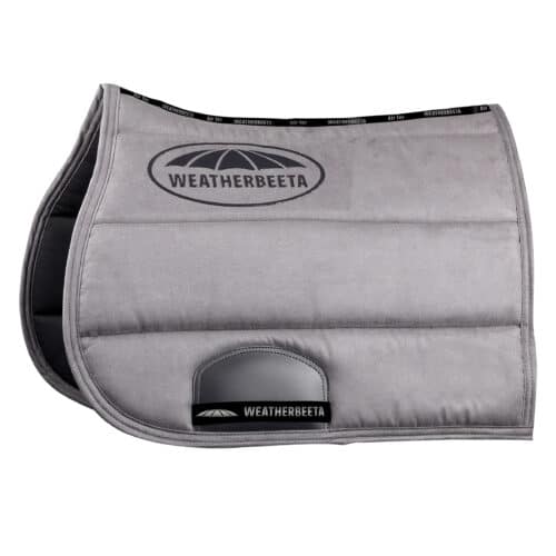 The WeatherBeeta Elite Soft and durable suede outer with a wick-away lining to help keep your horse cool dry and comfortable It offers some great features including a breathable mesh spine for extra airflow grippy silicone logo to reduce saddle slipping and a PVC-covered girth patch for added durability