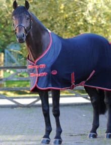 The versatile WeatherBeeta Fleece Cooler Standard Neck is ideal for travelling cooling or as an under rug It is a breathable and wickable fleece rug with anti-pill finish and nylon overlay at the shoulder to help prevent rubbing or stretching