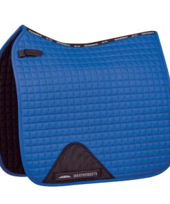 The WeatherBeeta Prime Dressage Saddle Pad is a durable cotton pad with a wick easy lining and breathable mesh spine to help keep your horse cool dry and comfortable